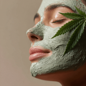 Close-up of woman’s face with green hemp cream facial mask applied and cannabis leaf next to her cheekbone in a wellness spa.